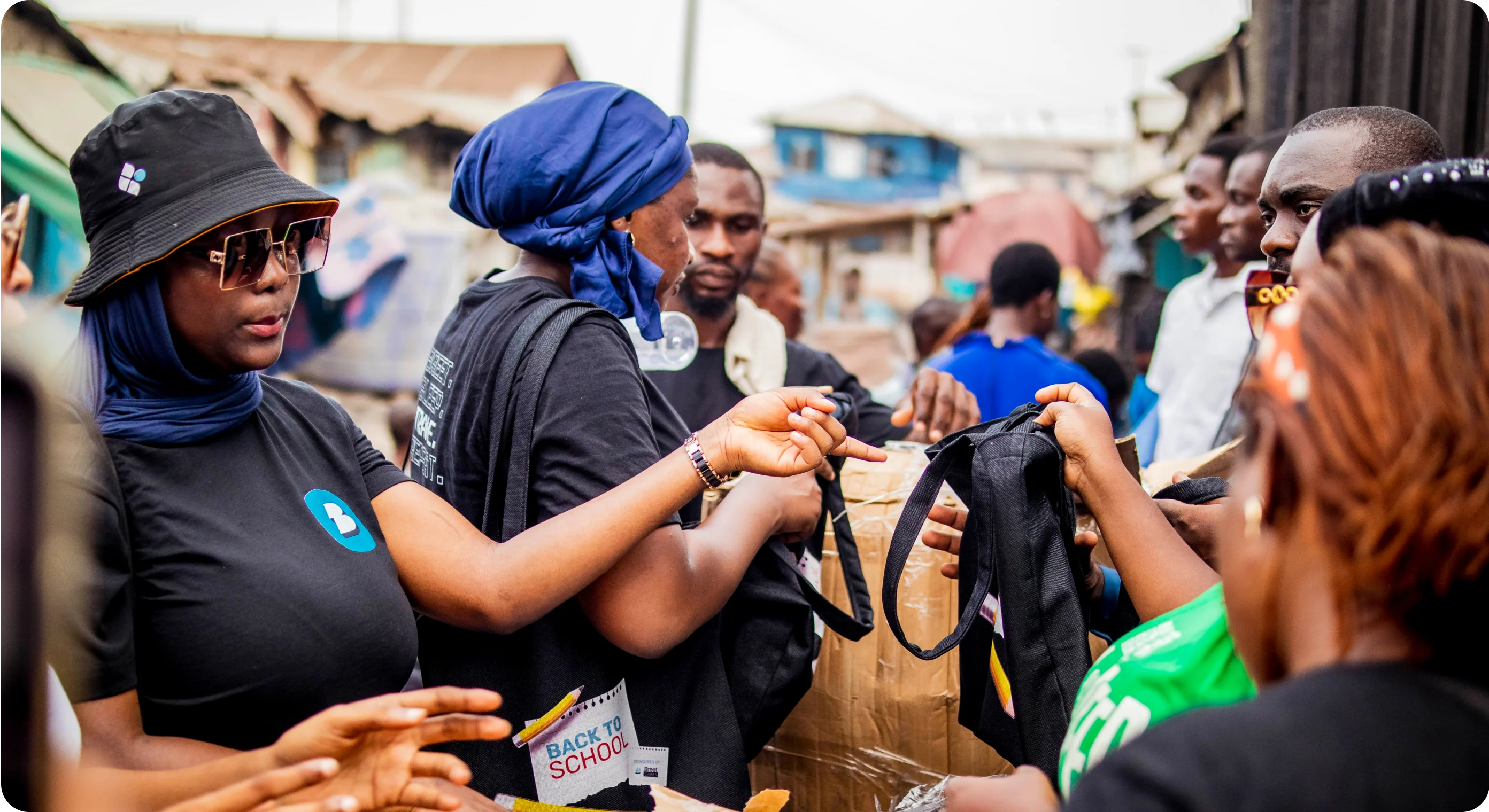 a lady giving instructions to others in a group