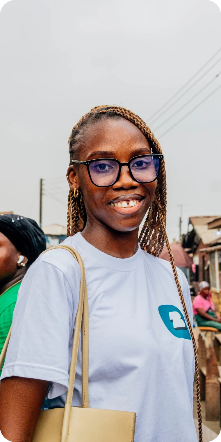 young lady wearing glasses smiling